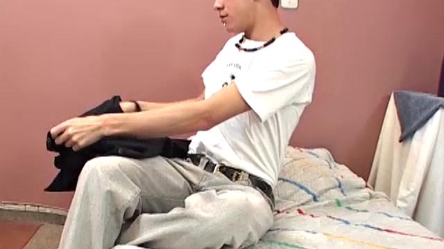 After enjoying a few rounds of paint ball, Gustavo heads home to enjoy some self-pleasuring on his bed. The Latino strips out of his clothes and grabs his big uncut cock.