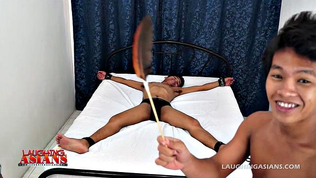 Warren Tickled By Two Boys