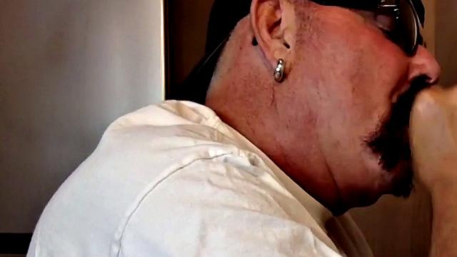 Gloryhole dude sucks hard cock while stroking it