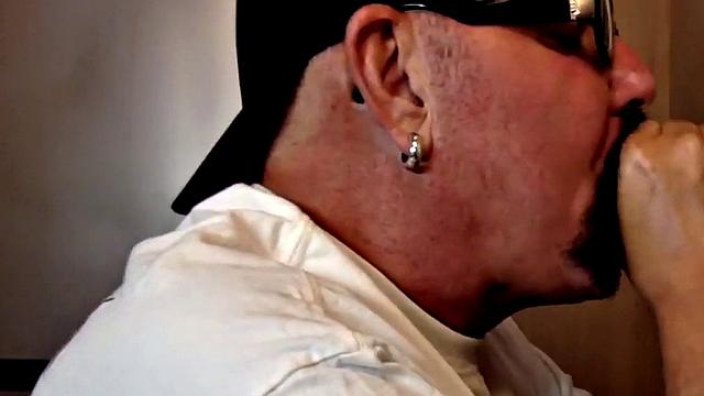 Gloryhole dude sucks hard cock while stroking it