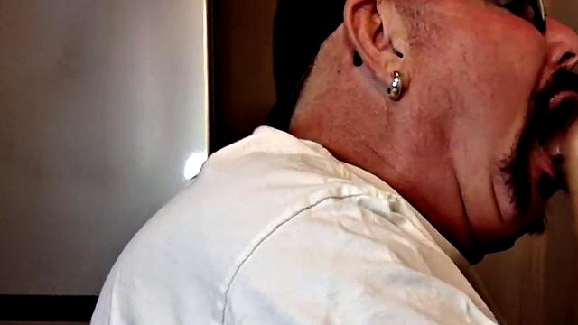 Gloryhole dude sucks hard cock while stroking it