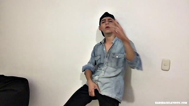 Paul is a skinny Latino, who starts his solo standing and teases us, as he strips naked. By the time the clothes are on the floor, Paul is fingering his ass and working up a boner.