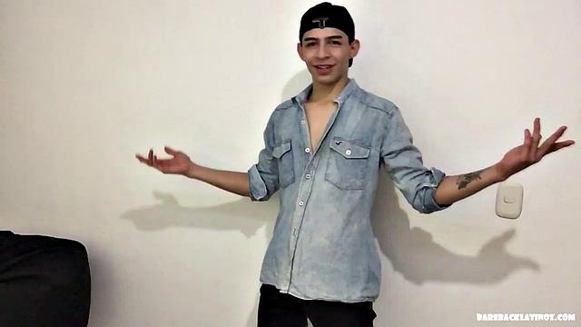 Paul is a skinny Latino, who starts his solo standing and teases us, as he strips naked. By the time the clothes are on the floor, Paul is fingering his ass and working up a boner.