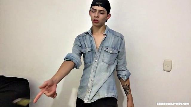 Paul is a skinny Latino, who starts his solo standing and teases us, as he strips naked. By the time the clothes are on the floor, Paul is fingering his ass and working up a boner.