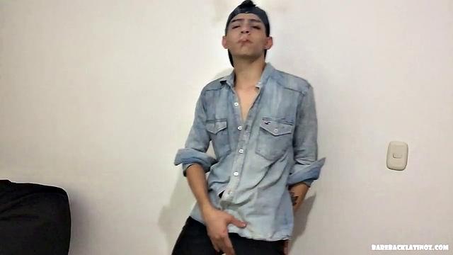 Paul is a skinny Latino, who starts his solo standing and teases us, as he strips naked. By the time the clothes are on the floor, Paul is fingering his ass and working up a boner.