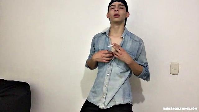 Paul is a skinny Latino, who starts his solo standing and teases us, as he strips naked. By the time the clothes are on the floor, Paul is fingering his ass and working up a boner.