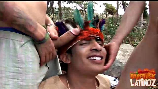 Four Latin guys are walking in the woods when two Latinos, badly dressed as Indians, take them captive. Everyone starts getting naked and sucking big uncut dick.