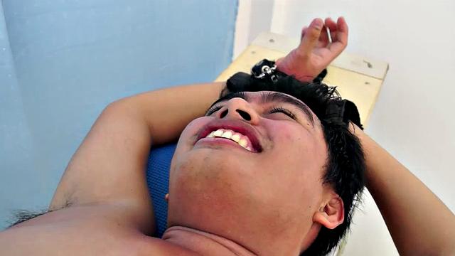 Chubby Asian boy Julius returns to Laughing Asians for a laughter-filled gay tickling excursion on our tickle rack.