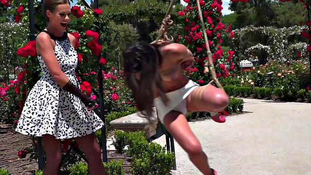 BDSM babe publicly whipped and humiliated by master and mistress