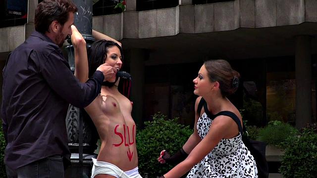 BDSM babe publicly whipped and humiliated by master and mistress