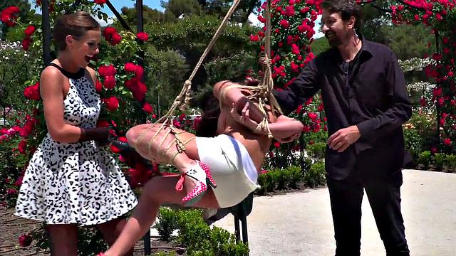 BDSM babe publicly whipped and humiliated by master and mistress