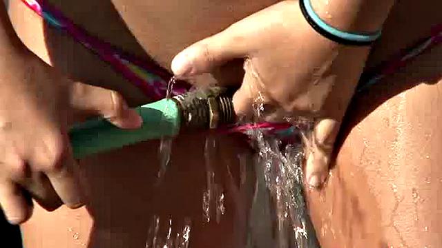 Sexy teen Kacey drenched in water