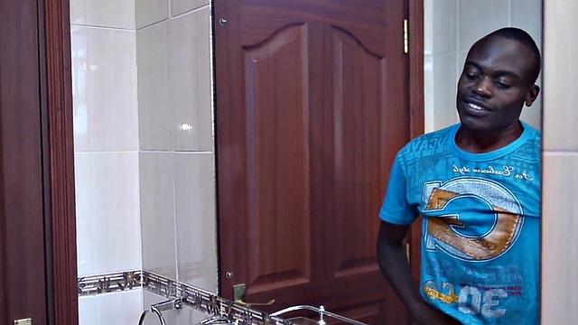 Watch skinny ebony amateur tease his uncut cock in the bathroom with her tight T-shirt on!