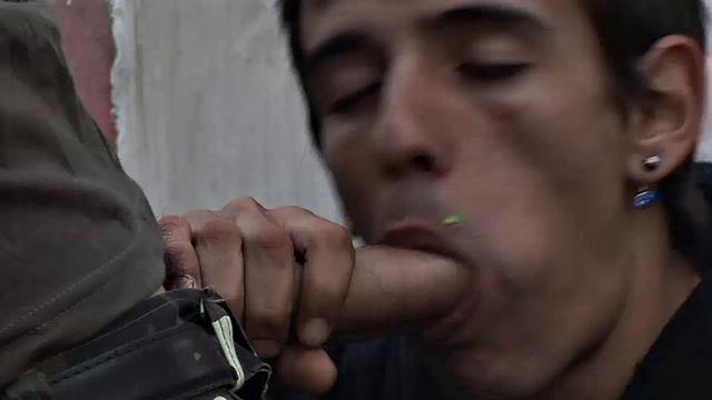 Young Latino Antonio is on guard duty and bored, so he decides to beat off. Erick catches him and soon has his hard dick out. The horny bottom makes it clear he wants Antonio's big raw cock up.