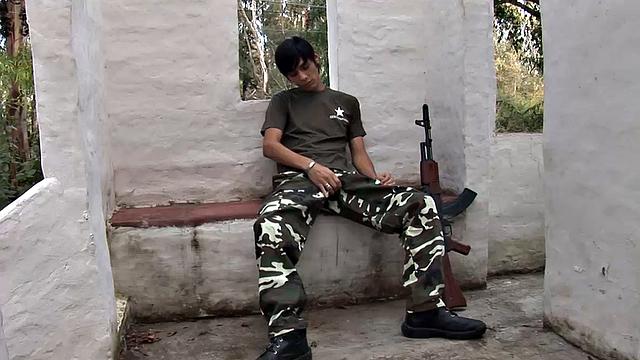 Young Latino Antonio is on guard duty and bored, so he decides to beat off. Erick catches him and soon has his hard dick out. The horny bottom makes it clear he wants Antonio's big raw cock up.