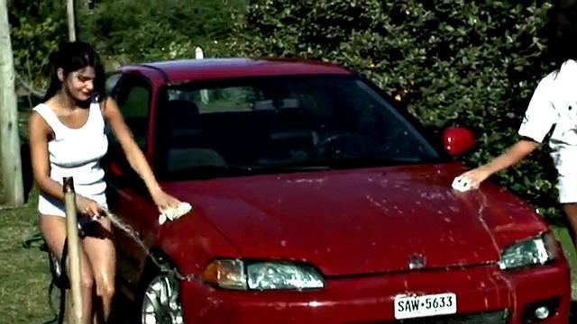 Wet and Wild: Sexy Brunette Teens Linger in Panties & T-shirts While Washing Car in the Rain