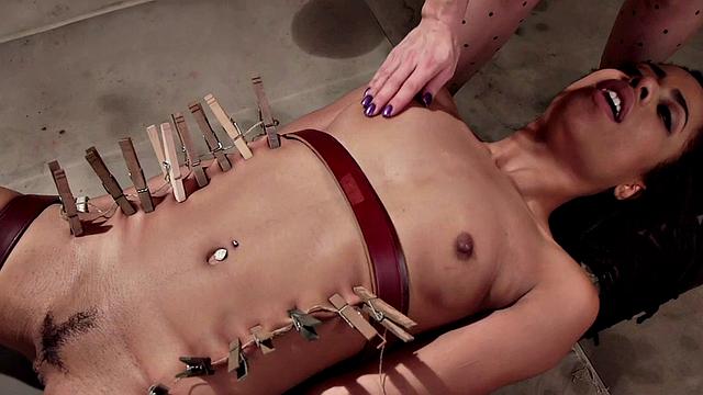 Clothespinned Ebony sub facesitted by lezdom in BDSM