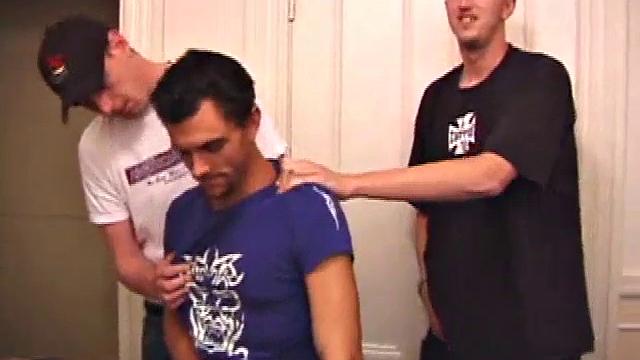 Mike Rimmer, Rod Filler, Tag, Silver are all relaxing after a busy day of finals. Silver climbs on the massage table and the boys give him some much needed physical attention.