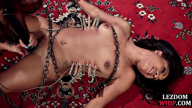 Petite ebony cutie fingered by dominatrix