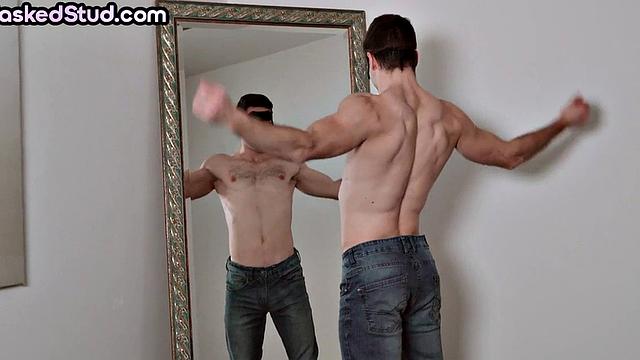 Solo amateur masked wanks cock and cums in front of mirror