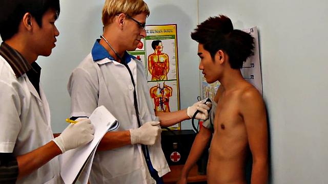 Asian twink fucked in medical 3some by doctors