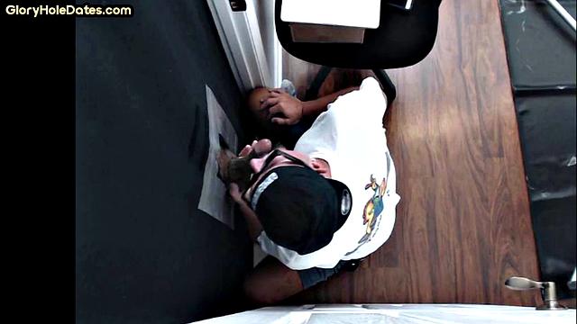 Gloryhole DILF sucks cock in amateur home video