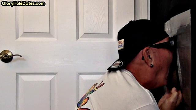 Gloryhole DILF sucks cock in amateur home video