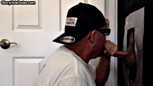 Gloryhole DILF sucks cock in amateur home video