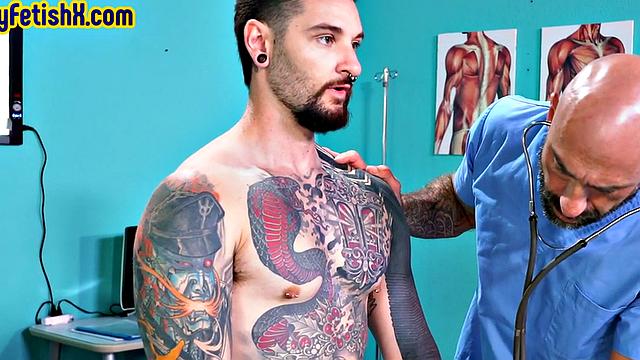 Analfisted tattooed jock in 3some by doctor