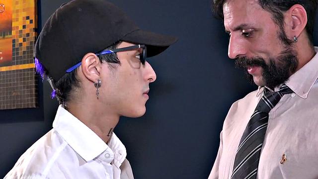 Tattooed daddy fucks skinny Latin twink in office