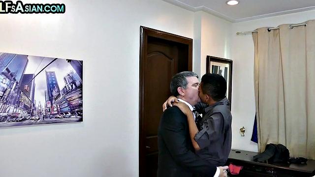 Skinny Asian twink fucked by office DILF in tight ass