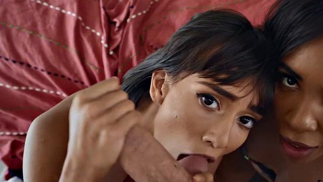 A busty ebony babe pleasure herself with a POV dick while sharing a cock in a steamy threesome