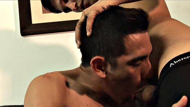 Jonas and Finn are young Latinos. We find the shirtless boys making out on a sofa, when a well-placed hand has a stiff dick in the bottom's mouth.