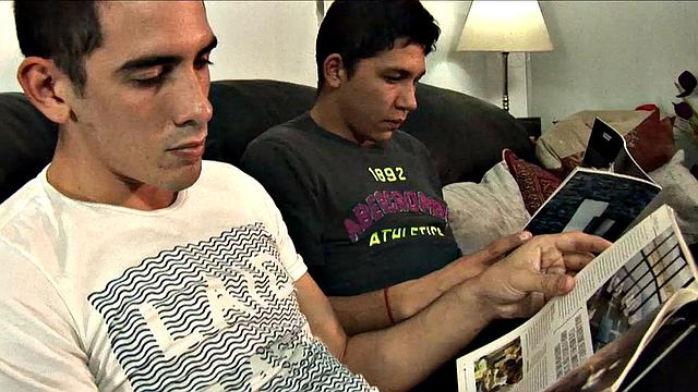 Jonas and Finn are young Latinos. We find the shirtless boys making out on a sofa, when a well-placed hand has a stiff dick in the bottom's mouth.