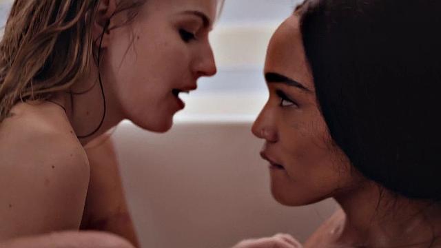 Kinky blondes get wet and wild in the bathtub while tribbing and licking each other's bald pussies