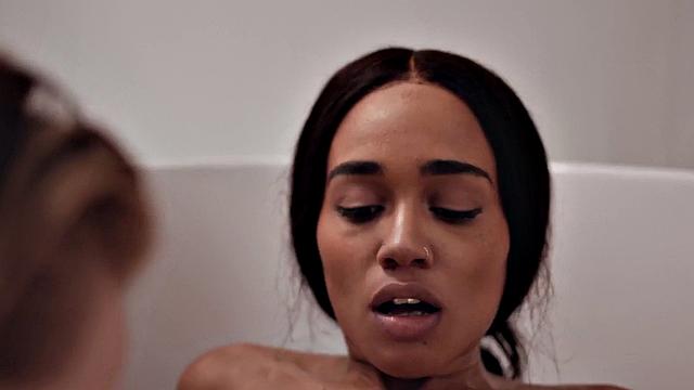 Kinky blondes get wet and wild in the bathtub while tribbing and licking each other's bald pussies