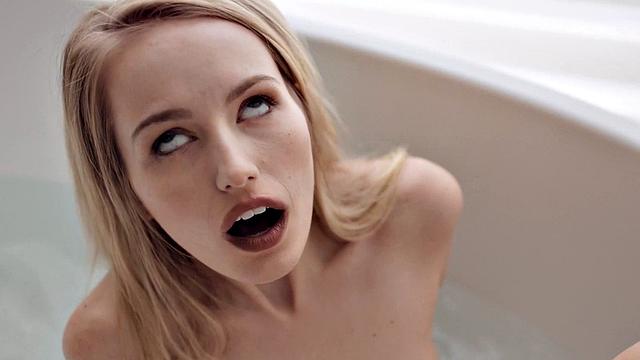 Kinky blondes get wet and wild in the bathtub while tribbing and licking each other's bald pussies