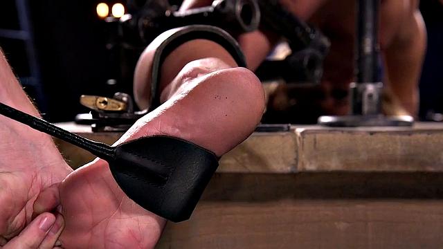 BDSM MILF suffers feet whipping lesson