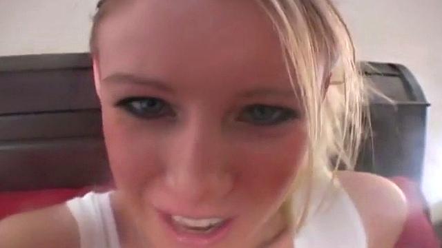 A kinky blonde teen use her feet to please herself with a dildo toy