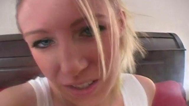 A kinky blonde teen use her feet to please herself with a dildo toy