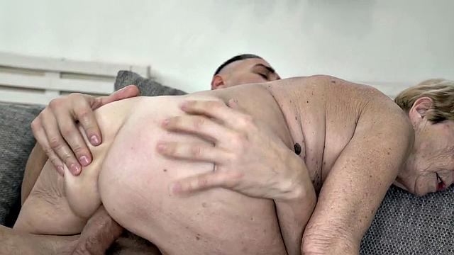 Hairy pussy Granny slut with medium bobs fucked on the couch