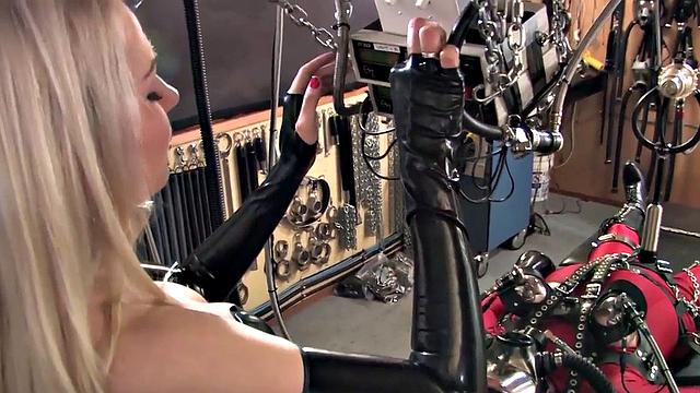 Femdom MILF torments sub with sex toy in BDSM session