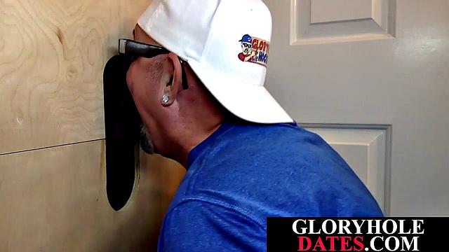 Mature daddy sucks dick through gloryhole