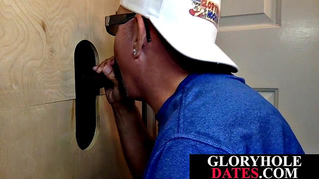 Mature daddy sucks dick through gloryhole