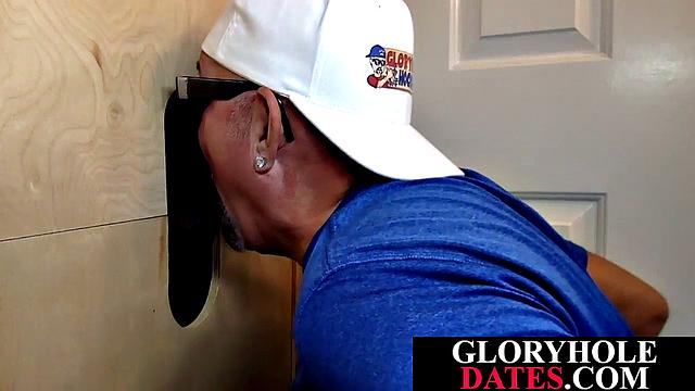 Mature daddy sucks dick through gloryhole