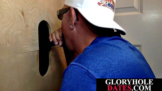 Mature daddy sucks dick through gloryhole