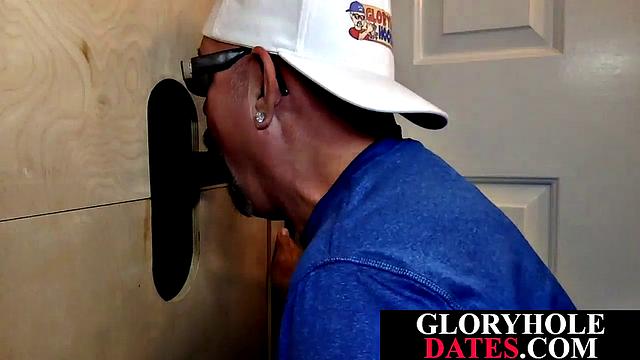 Mature daddy sucks dick through gloryhole