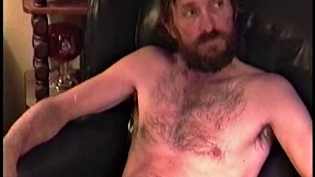 Chuck strips down and gets his cock worked by another man