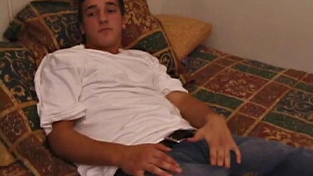 Race Banner has that sexy bad boy look that so many enjoy. He's stretched out on the bed, watching a porn video and rubbing his rapidly growing cock. His shirt comes off and he slides a hand inside his pants to pull at the stiff dick inside.