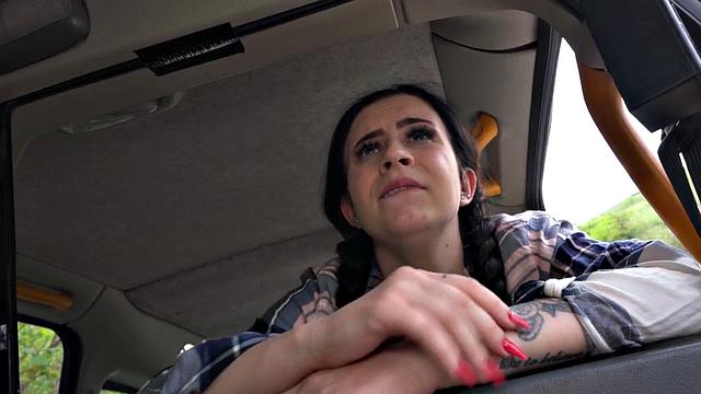 Cab inked babe gets pussypounded by driver in back seat